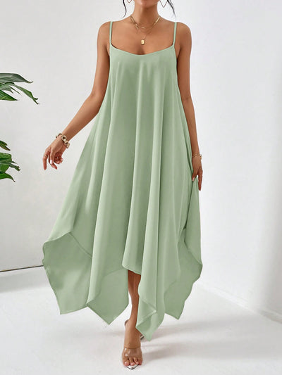 Tap into your inner fashionista with our Mint Green Essence Dress. This simple yet stylish summer dress features a loose fit and an asymmetric hemline, adding a unique touch to your wardrobe. Made with high-quality material, this dress offers both comfort and style for any occasion.