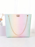 The Geometric Color Collision Shoulder Tote combines style and function for the perfect summer accessory. With its unique geometric design and vibrant color palette, this tote is sure to turn heads. Its spacious interior and comfortable shoulder straps make it ideal for everyday use.