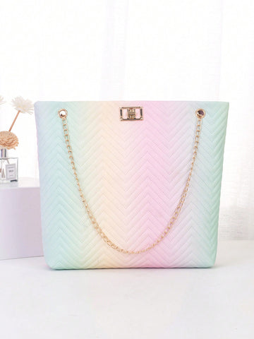 The Geometric Color Collision Shoulder Tote combines style and function for the perfect summer accessory. With its unique geometric design and vibrant color palette, this tote is sure to turn heads. Its spacious interior and comfortable shoulder straps make it ideal for everyday use.