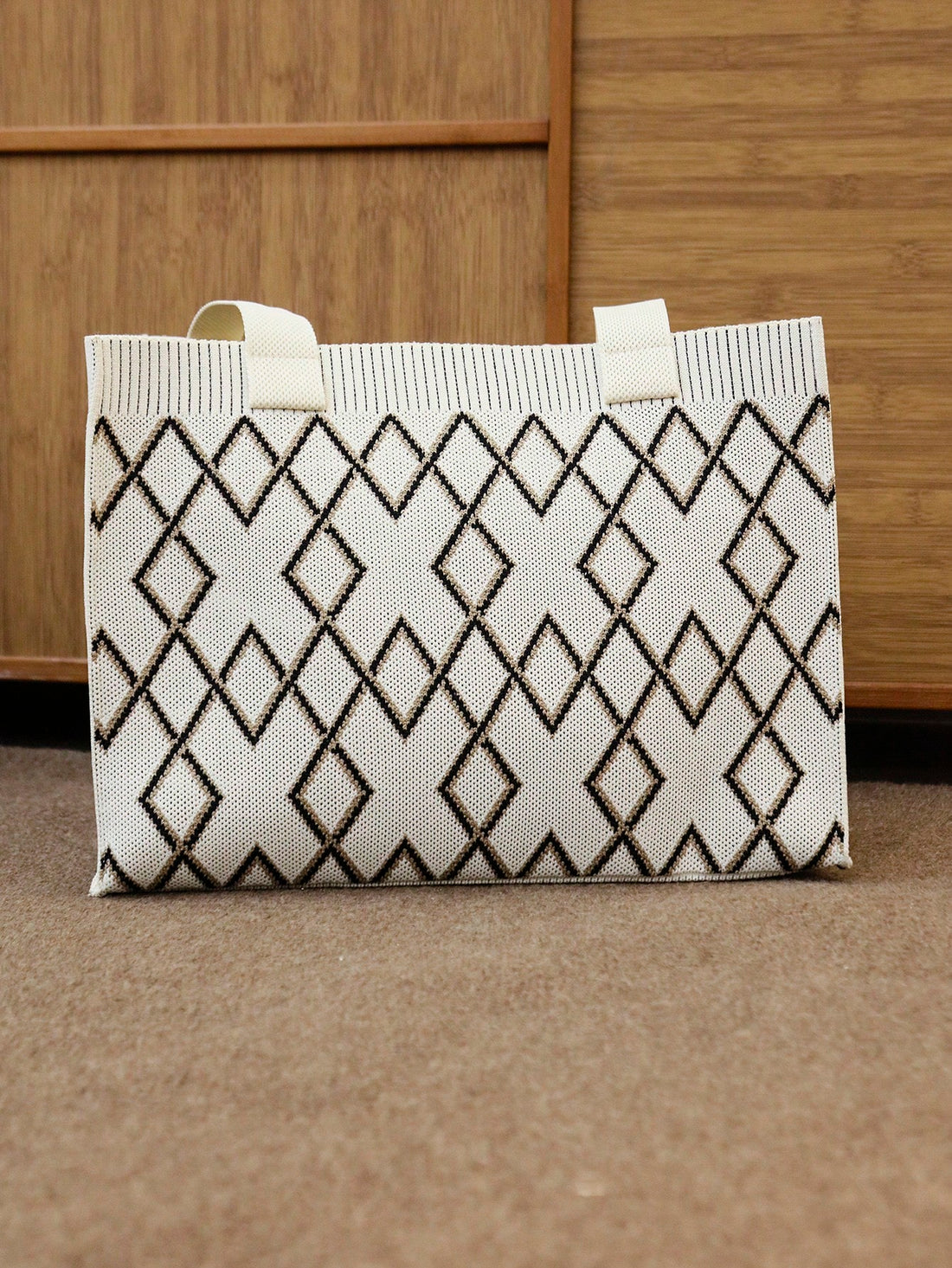 This Chic and Practical Large Knitted Shoulder Tote Bag is the perfect accessory for any fashion-forward woman. The spacious interior provides plenty of room for all of your essentials, while the knitted design adds a touch of style and texture. Made with high-quality materials, this tote bag is both durable and fashionable, making it a must-have for any wardrobe.