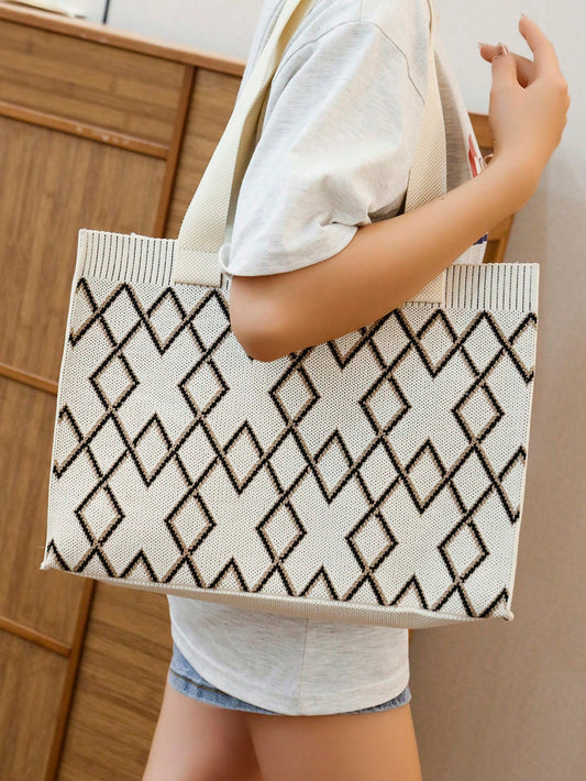 This Chic and Practical Large Knitted Shoulder Tote Bag is the perfect accessory for any fashion-forward woman. The spacious interior provides plenty of room for all of your essentials, while the knitted design adds a touch of style and texture. Made with high-quality materials, this tote bag is both durable and fashionable, making it a must-have for any wardrobe.