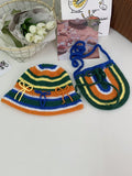 This Rainbow Striped Knitting Hat & Bag Set features a vintage crochet fisherman style that makes it perfect for those looking to add a touch of retro charm to their winter wardrobe. The rainbow stripes add a pop of color, while the bag provides convenience and functionality. Stay warm and stylish with this unique set.