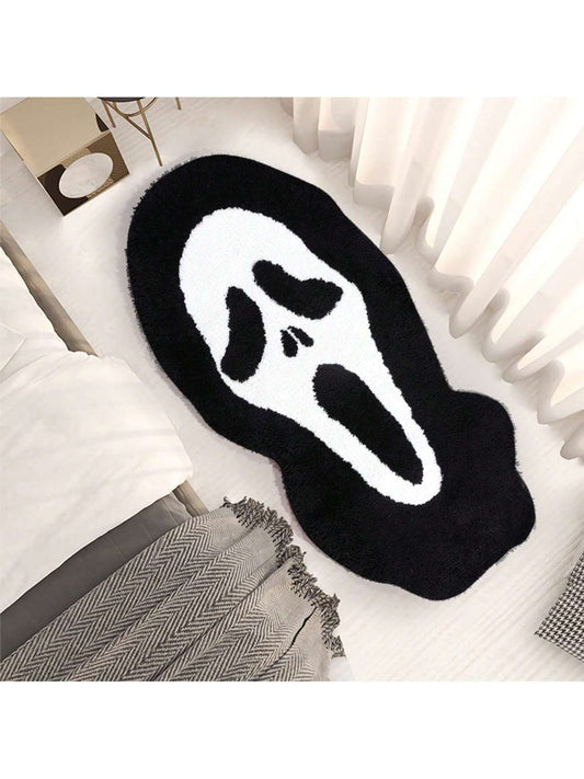 Introducing the Spooky and Stylish Large Skull Bath Mat - the perfect addition to your Halloween decor. Made with fluffy black material, this decorative rug adds a touch of spookiness to any bathroom. Transform your space and enjoy a soft and stylish escape from the scary season.