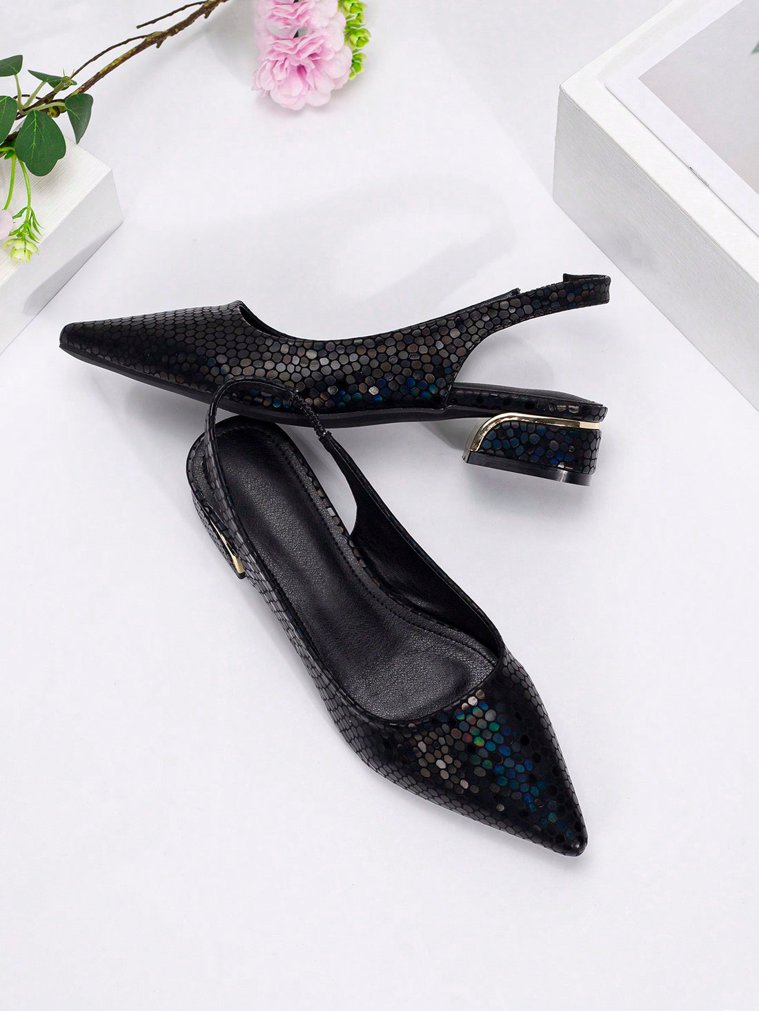 Effortlessly elevate your style with our Chic and Comfortable Pointed Toe Backless Pumps. The pointed toe design and thick heels provide ultimate comfort while the chic design adds a touch of sophistication to any outfit. Perfect for all-day wear, these pumps are a must-have for any fashion-forward individual.