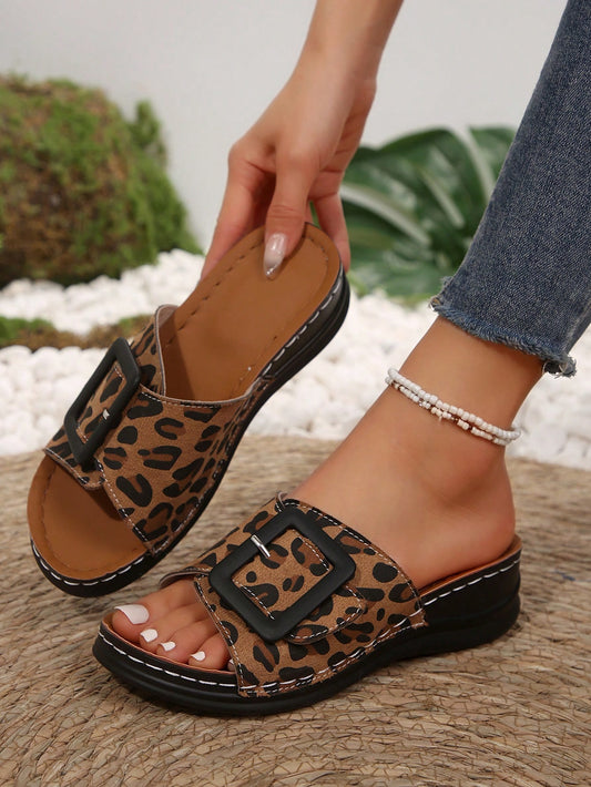 Add a fierce statement to your summer wardrobe with our Wildly Chic Leopard Print Wedge Sandals. Made for outdoor adventures, these sandals offer a comfortable and stylish design to keep your feet supported all day long. Perfect for any occasion, upgrade your summer look with a touch of wildness.