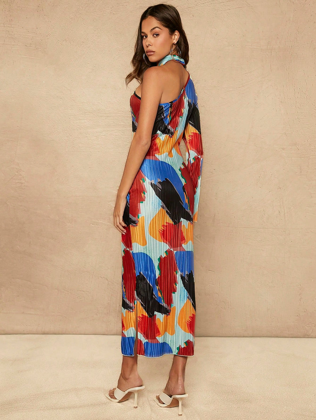 Elevate your style with our Chic One-Shoulder Abstract Plisse Dress! Show off your sophisticated side with this unique design that is perfect for any occasion. The one-shoulder cut adds a touch of elegance, while the abstract print and plisse fabric create a bold and eye-catching look. Upgrade your wardrobe with this must-have dress!