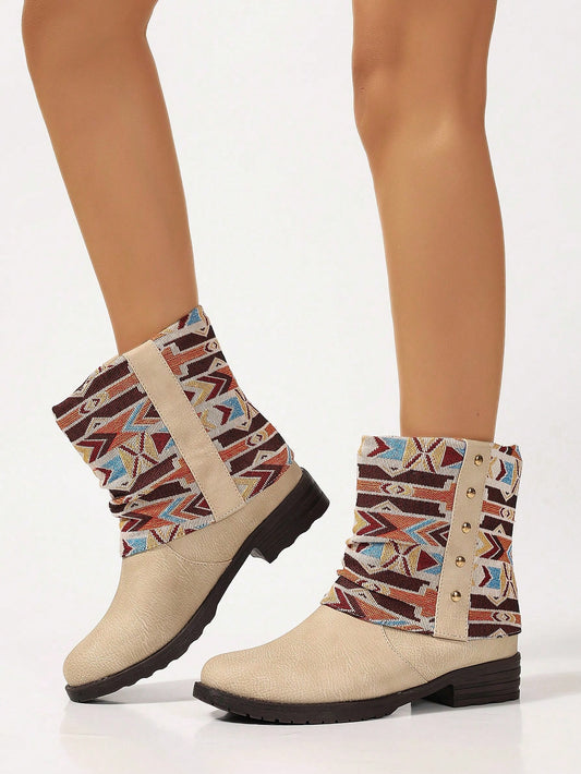 Elevate your style with our Bohemian Blooms: Beige Chunky Heel Ankle Boots. These boots feature a stunning floral patchwork design that adds a touch of bohemian charm to any outfit. The chunky heel provides stability and comfort, making them perfect for all-day wear. Step out in style with these unique and versatile boots.