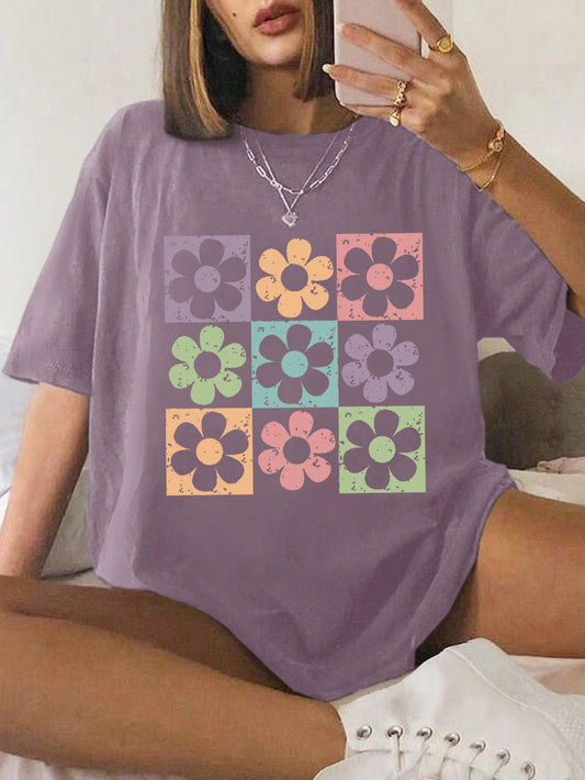 Introducing the Summer Blossom t-shirt: the perfect addition to your casual wardrobe. With its vibrant floral print, this shirt is sure to add a touch of fun and femininity to any outfit. Made from soft and breathable fabric, it is both comfortable and stylish. Elevate your fashion game with Summer Blossom.