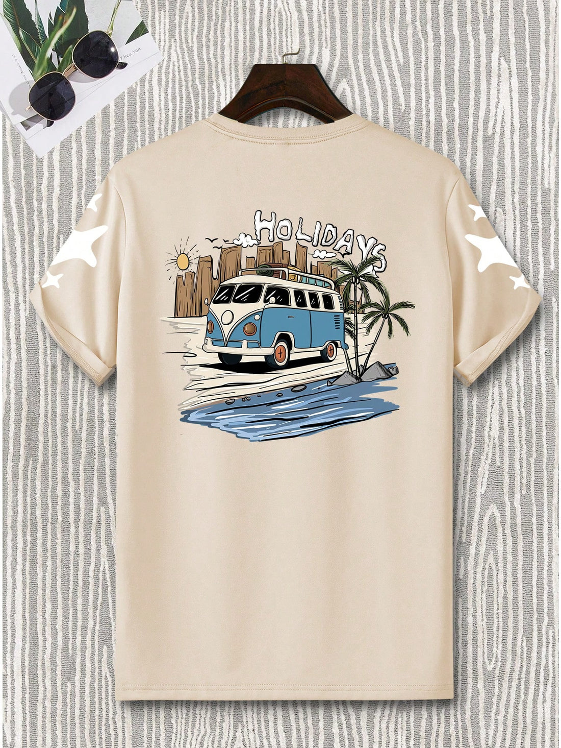 This summer, elevate your style with our Beach Holiday Pattern T-Shirt. Featuring a unique beach-inspired pattern on the back, this short sleeve men's shirt is perfect for warm weather. Made with comfortable fabric, it's designed for both style and comfort. Make a statement with this must-have piece for any upcoming vacation.