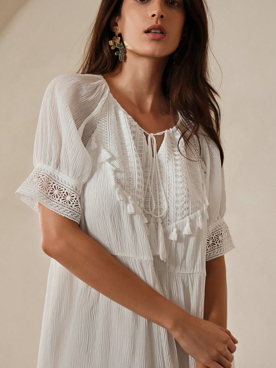 Effortlessly exude elegance with our Chic Patchwork Lace Dress. Featuring a charming tie collar and delicate lace patchwork, this dress is perfect for any occasion. Show off your effortless style and make a statement wherever you go!