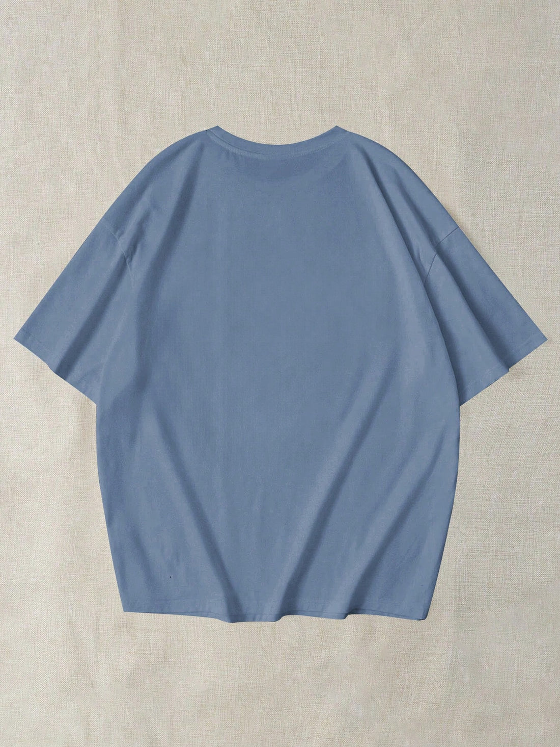 Introducing our Chic Comfort casual t-shirt, designed for women who value both style and comfort. With a loose fit and drop shoulder design, this t-shirt offers unrestrictive movement while the letter print adds a touch of personality. Say goodbye to sacrificing fashion for comfort with Chic Comfort.