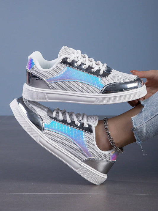 Experience ultimate comfort and style with our Silver Summer Sneakers. The color-changing feature adds a touch of uniqueness, while the mesh and leather patchwork provide breathability and durability. Elevate your shoe game this summer and turn heads wherever you go.