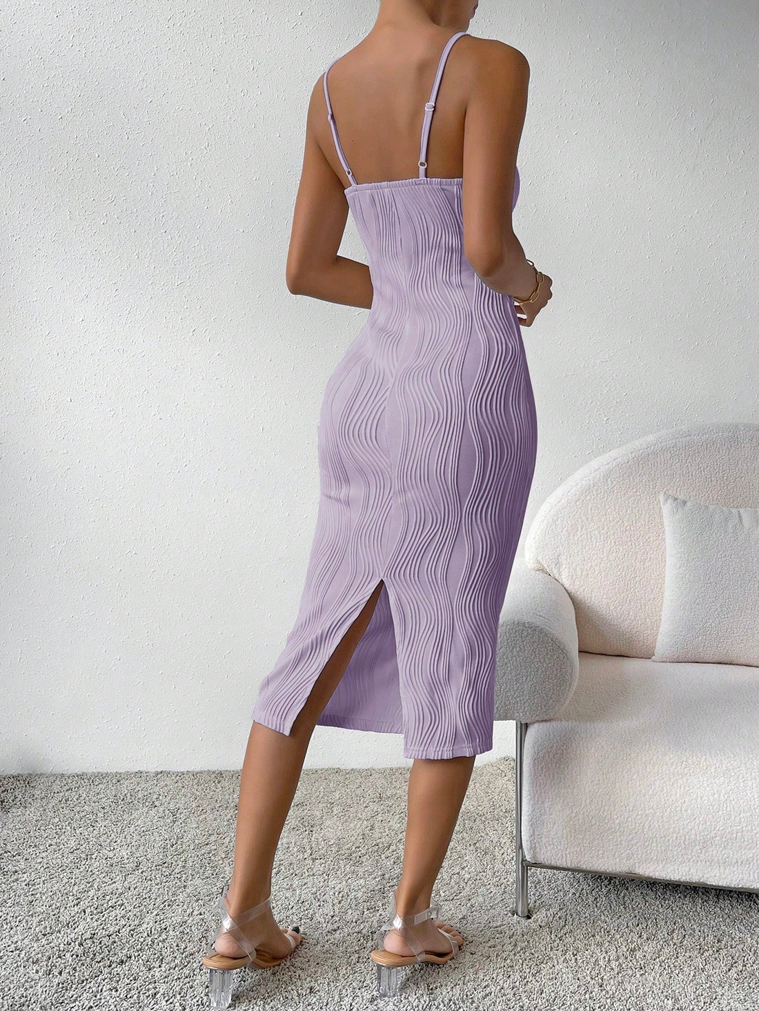 Experience elegance and comfort this summer with our Essence of Elegance Cami Dress. Made with a slim fit and textured fabric, this dress will flatter your figure while keeping you cool in the heat. Elevate your summer wardrobe with our solid color and style it for any occasion.