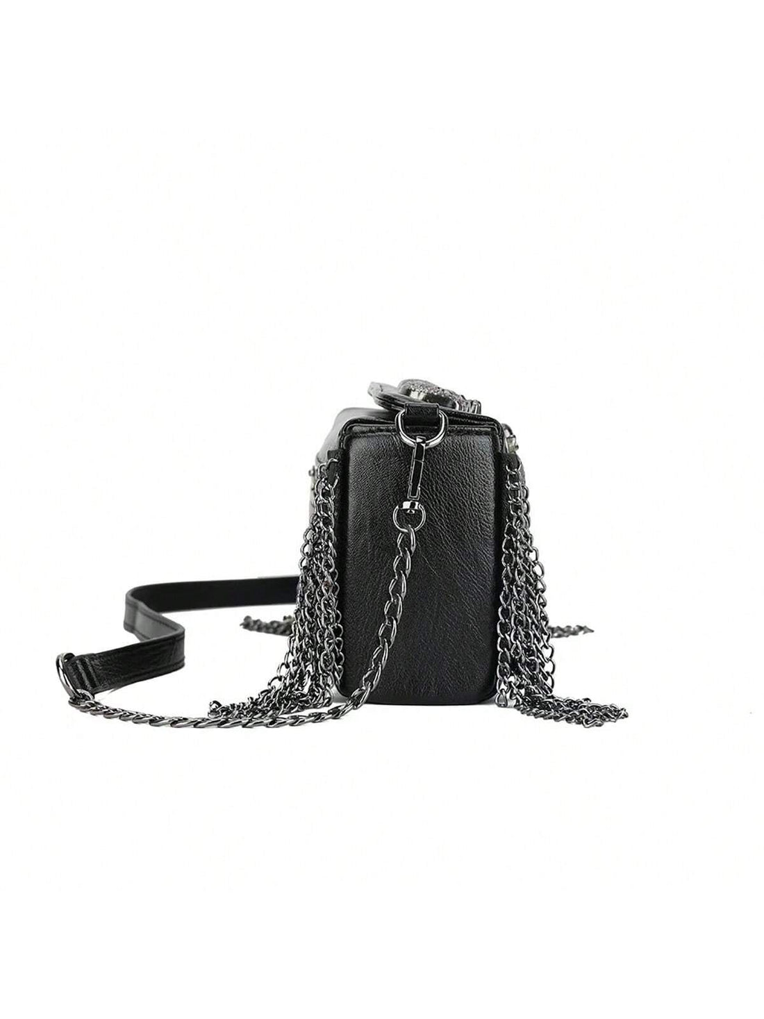 Introducing our Sleek and Stylish Gothic Skull Head Crossbody Bag for Women. Made with high-quality materials, this bag is perfect for the modern woman looking for a touch of gothic style. With its unique skull head design, this crossbody bag will add a bold and edgy statement to any outfit. Stay fashionable and organized with this must-have accessory.