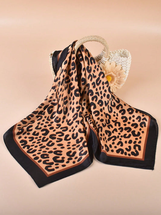 Elevate your style and protect your skin with our Chic Leopard Print Silk Scarf. Stand out in this trendy, lightweight scarf while staying safe from the sun's harmful rays. Embrace your wild side with fashion and function.