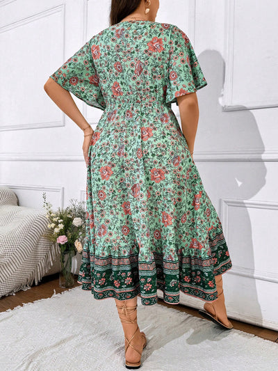 Floral Bliss Plus Size Holiday Dress: Flared Hem & Cinched Waistline