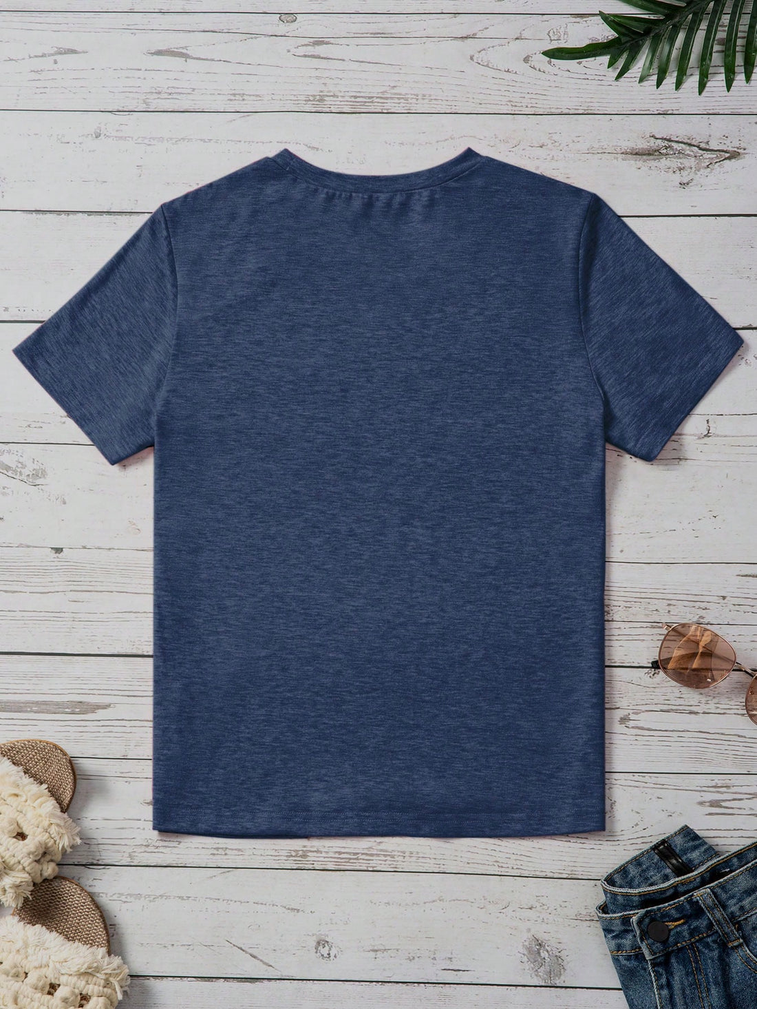 Get ready for some playful style with our Whimsical Octopus Graphic Tee! This casual short sleeve top is perfect for spring and summer, featuring a quirky octopus graphic that adds a touch of fun to any outfit. Express your unique sense of style with this must-have addition to your wardrobe.