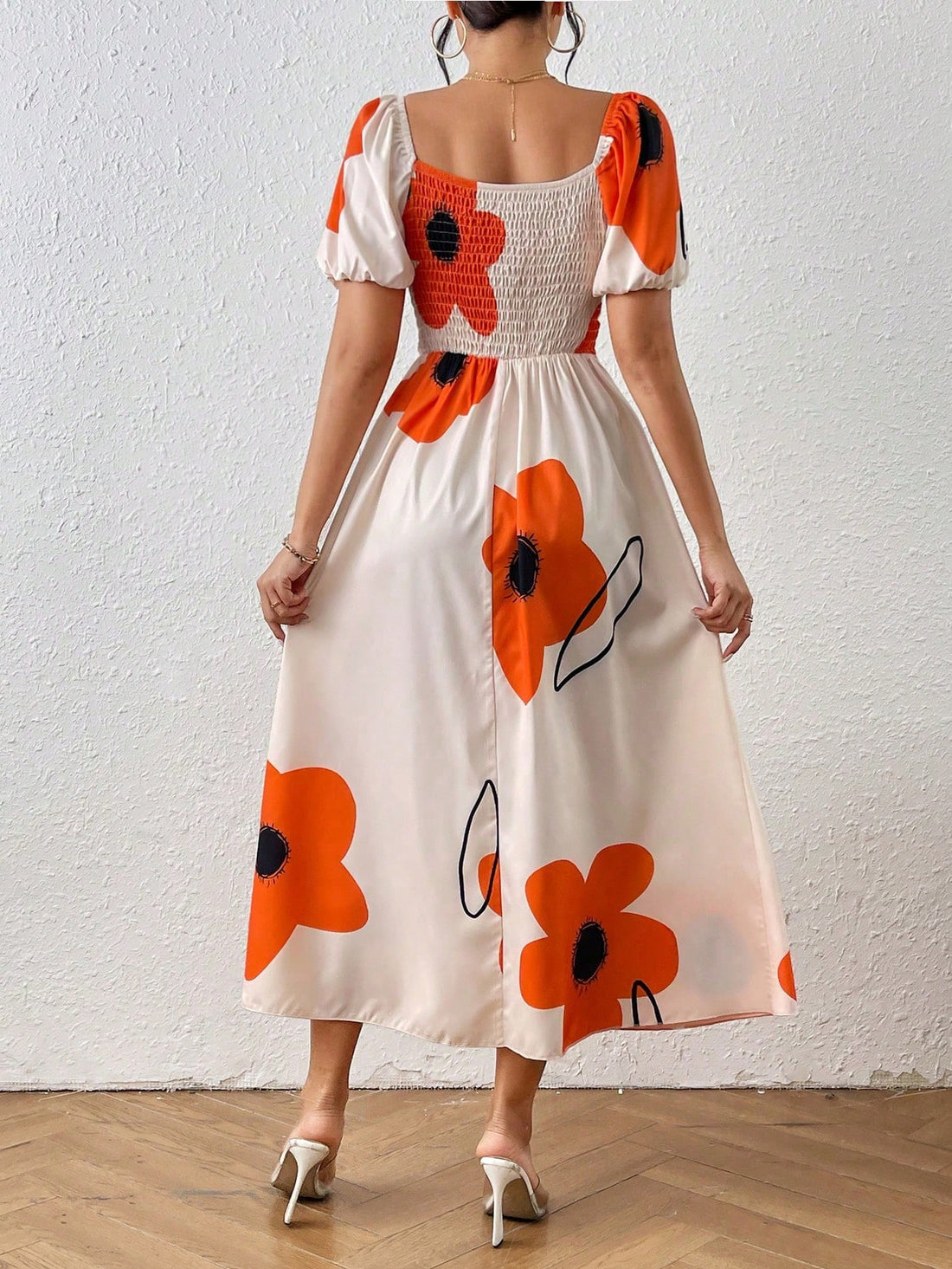 Unleash your inner free-spirited fashionista with our Boho Chic Maxi Dress! The elegant floral print and trendy off-shoulder design exude effortless summer style. Puff sleeves add a playful touch, while the side split offers a hint of allure. The perfect choice for a bohemian-inspired look.