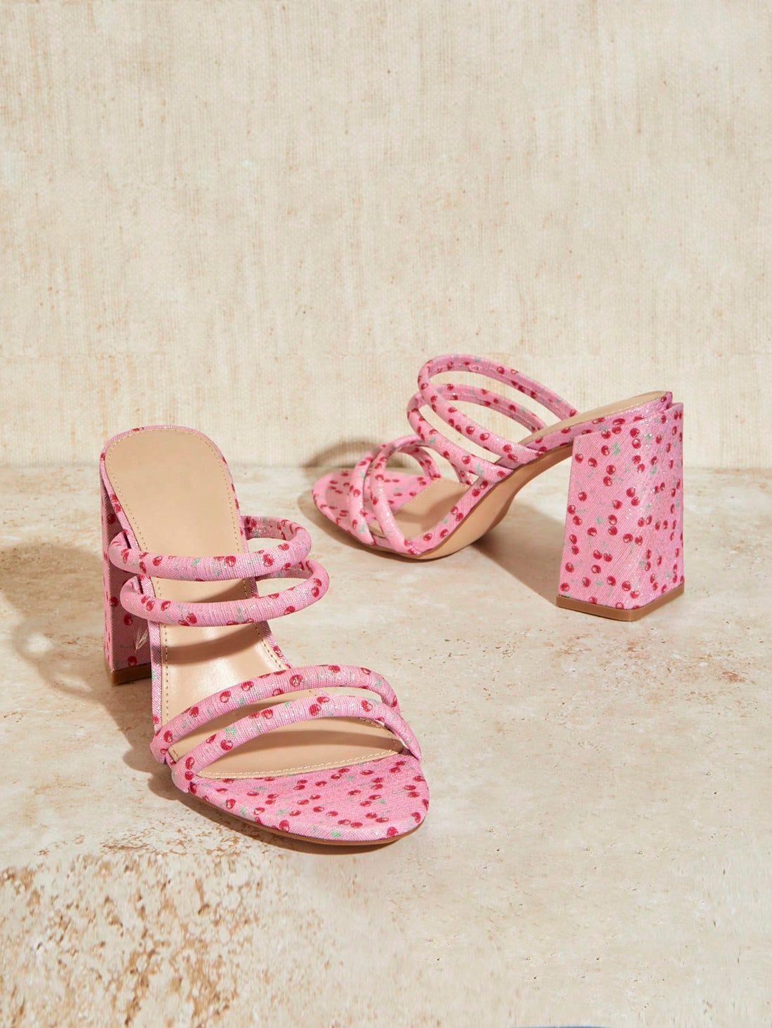 Step into summer with our vintage-inspired Cherry Blossom Peep Toe Sandals! The delicate cherry blossom print and peep toe design bring a touch of feminine charm to any outfit. Perfect for sunny holidays, these sandals offer a timeless and stylish way to stay cool and comfortable.