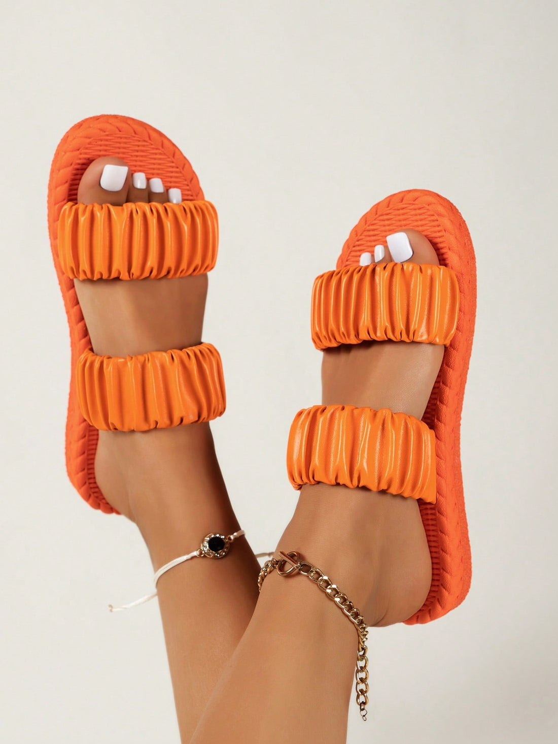 Step into summer fun with these cute orange flat shoes designed just for women! Featuring a fresh fold design, they’re easy to slip on and off while adding a splash of vibrant color to your beach days. The slip-resistant sole keeps you steady on sandy shores or poolside, making every step safe and stylish. Perfect for sunny adventures, these sandals blend comfort and playful charm effortlessly.