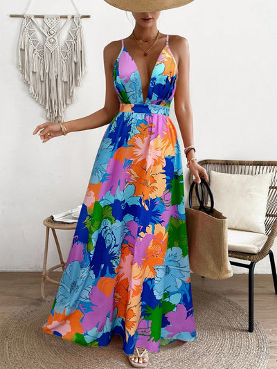 Introducing the Vibrant Vacation Chic: Flower Printed Spaghetti Straps Backless Dress! Made for the fashion-forward traveler, this dress boasts a bold floral print and alluring backless design. Perfect for warm weather getaways, you'll feel chic and confident in this statement piece.