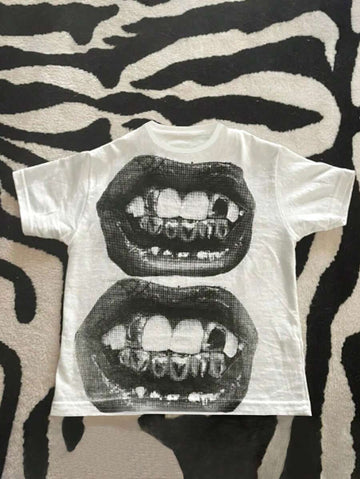 Front flat lay of white gothic lips graphic T-shirt with black distressed mouth print