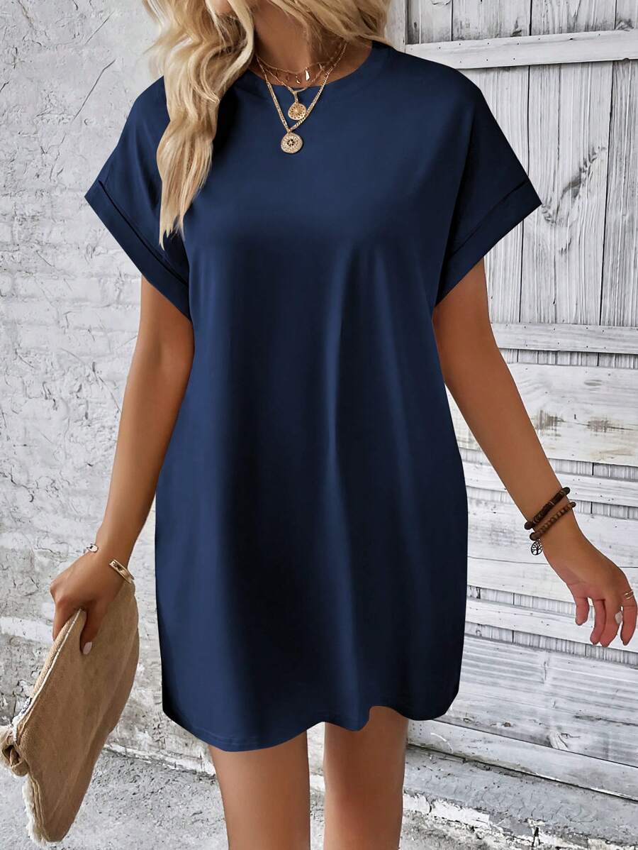 Navy T-shirt mini dress with loose straight fit crew neck cuffed sleeves and short hem