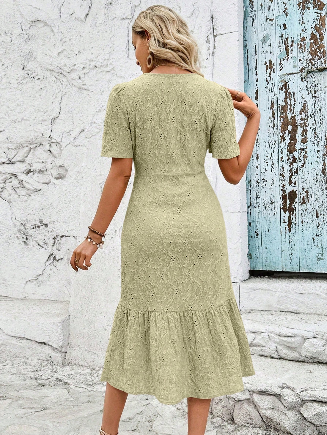 This breezy v-neck dress pairs chic style with playful details. The puff sleeves add a touch of whimsy, while the ruffle hem adds a flirty flair. Perfect for any occasion, this dress will have you feeling effortlessly stylish and carefree.