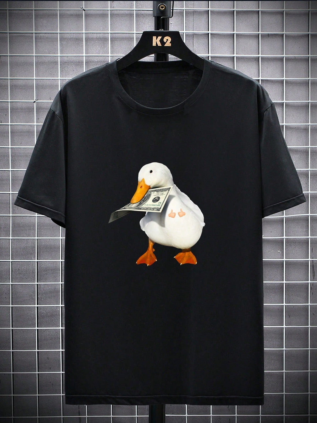 This men's casual printed round neck t-shirt is a versatile addition to any wardrobe. Made with high-quality materials, it offers both comfort and style. With its unique printed design, this shirt is sure to make a statement. Perfect for everyday wear or dressing up for a special occasion, this t-shirt is a must-have for any fashion-forward man.