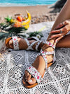 Elevate your summer style with our Summer Chic Floral Fabric Roman Strap Flat Sandals. Crafted with a durable floral fabric and featuring a comfortable strap design, these sandals are perfect for all-day wear. Enjoy the perfect blend of style and comfort with these chic sandals.