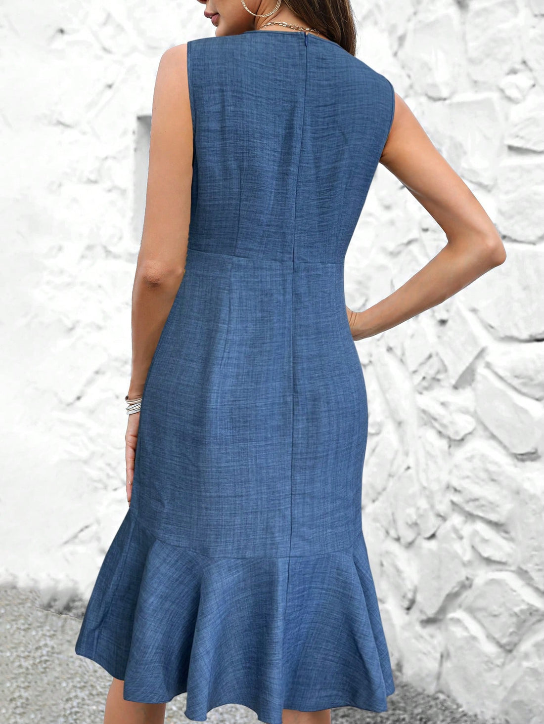 This chic sleeveless dress boasts elegant stripes and a playful ruffled twist for the ultimate summer look. With a timeless design and comfortable fabric, this dress offers both style and comfort for any occasion. Embrace summer elegance and stand out in this must-have dress.