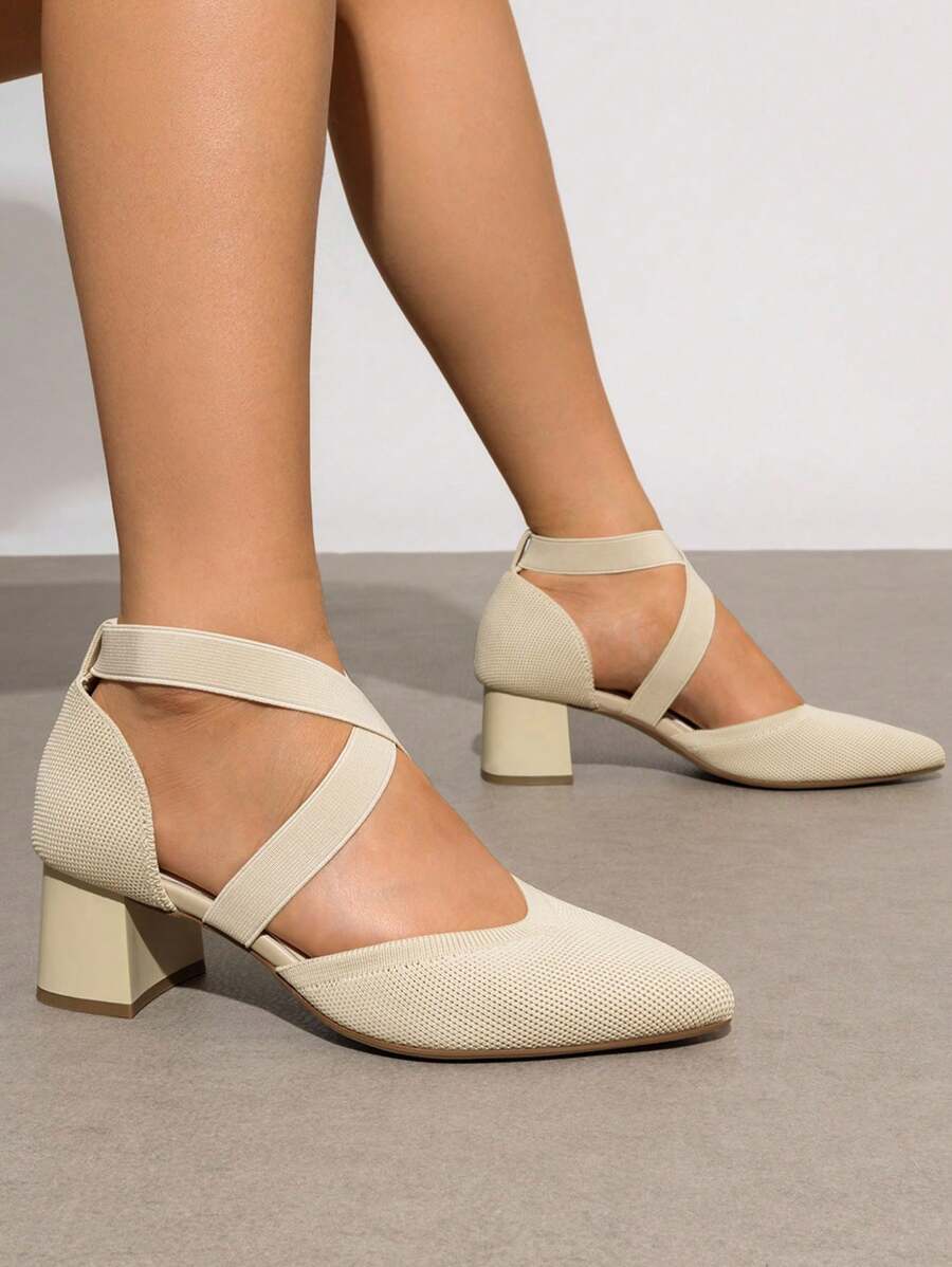 Elevate your everyday style with these sophisticated pointed-toe chunky heels. Featuring a chic knitted design with a secure ankle strap, these mid-heel pumps deliver comfort without compromising elegance. The criss-cross detailing adds visual interest, while the sturdy chunky heel provides stability for all-day wear. Perfect for the office, special occasions, or holiday celebrations, these versatile apricot heels transition seamlessly from professional settings to festive gatherings. A timeless addition to