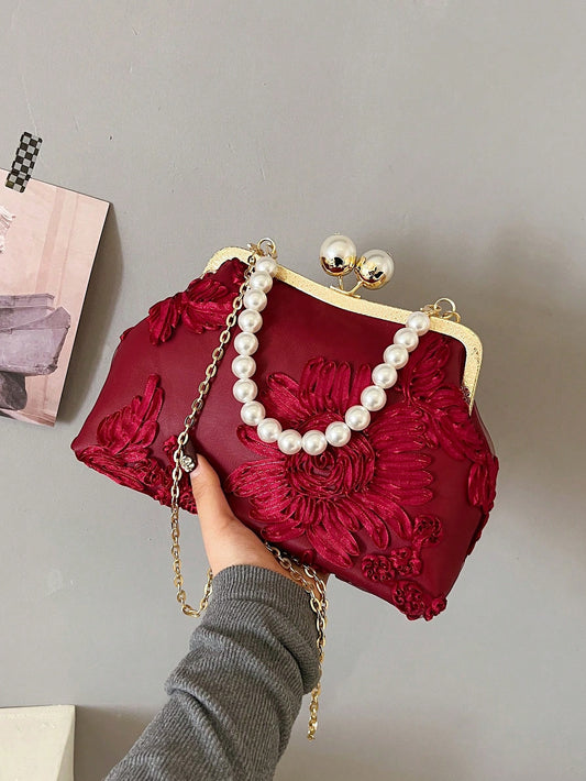 Expertly crafted for special occasions, our Romantic Wine Red 3D Flower Handbag is adorned with faux pearls for a touch of elegance. The intricate 3D flower design adds romantic charm to any outfit. Ideal for formal events or date nights, this handbag is the perfect accessory for a polished and sophisticated look.