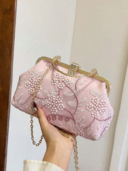 Elevate your style with our Chic Pink Lace Embroidery Shoulder Bag. Perfect for parties, weddings, and special occasions, this bag adds a touch of elegance to any outfit. The intricate lace embroidery and versatile shoulder strap make it both fashionable and functional. Get ready to turn heads with this must-have accessory.