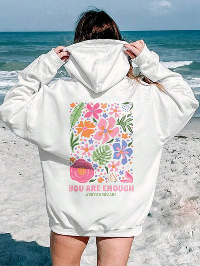 Introducing Floral Bliss, the ultimate women's sweatshirt for comfort and style. With its drop shoulder design and adjustable drawstring hood, stay cozy and on-trend. Made with premium materials, experience pure comfort in this floral print sweatshirt. Perfect for any casual occasion.