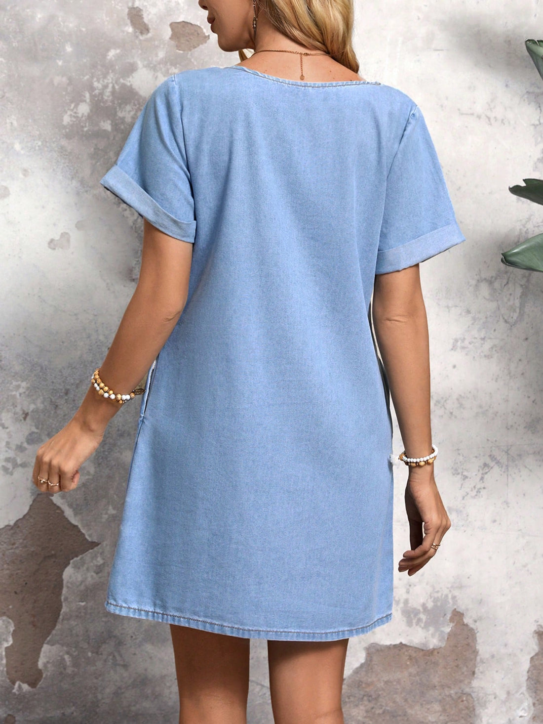 Get ready to upgrade your wardrobe with our Effortlessly Chic Denim Dress! Made for the playful and fashionable woman, this dress features a round neck, comfortable fit, and functional pockets. Stay stylish and effortlessly chic with this timeless denim dress.