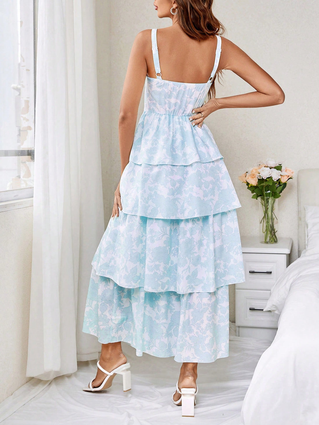 Step into summer with our Flower Power dress! Made with lightweight fabric and multi-layered for a flowy fit, this dress boasts a vibrant floral print and spaghetti straps for a touch of femininity. Perfect for any occasion, feel confident and stylish in our trendy and comfortable design.