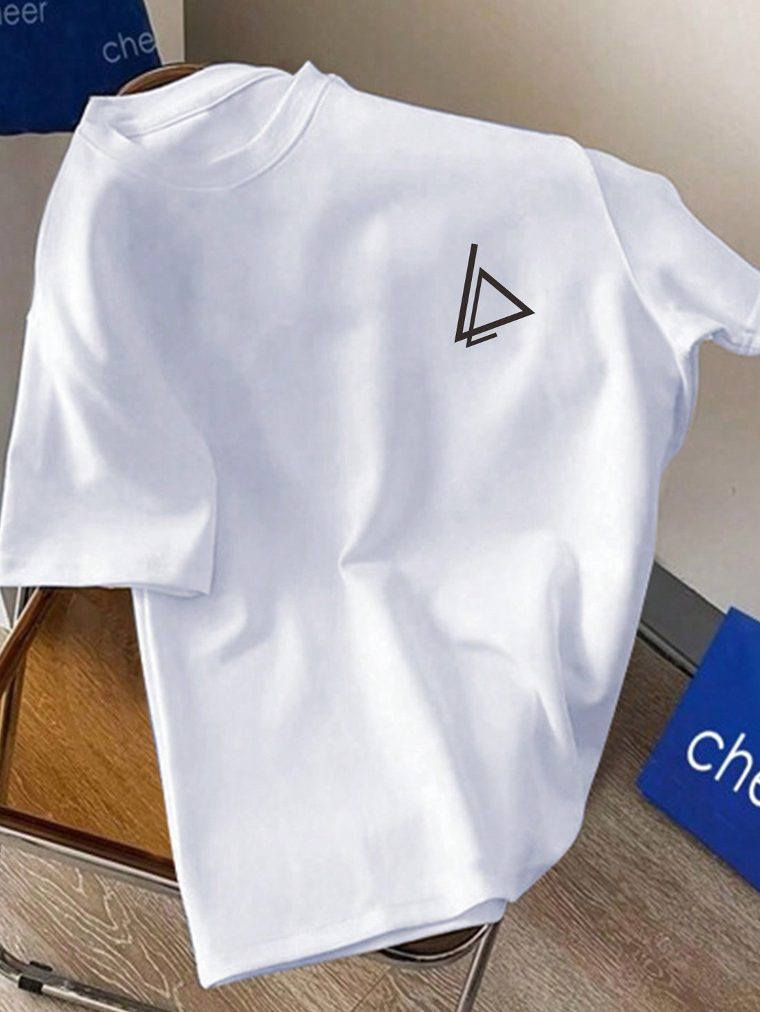 Surprise your trendy boyfriend with this must-have summer tee! Featuring a unique geometric graphic design, this is the perfect gift that will make him stand out in style. Get ready to make his summer even hotter with this trendy and fashionable shirt!