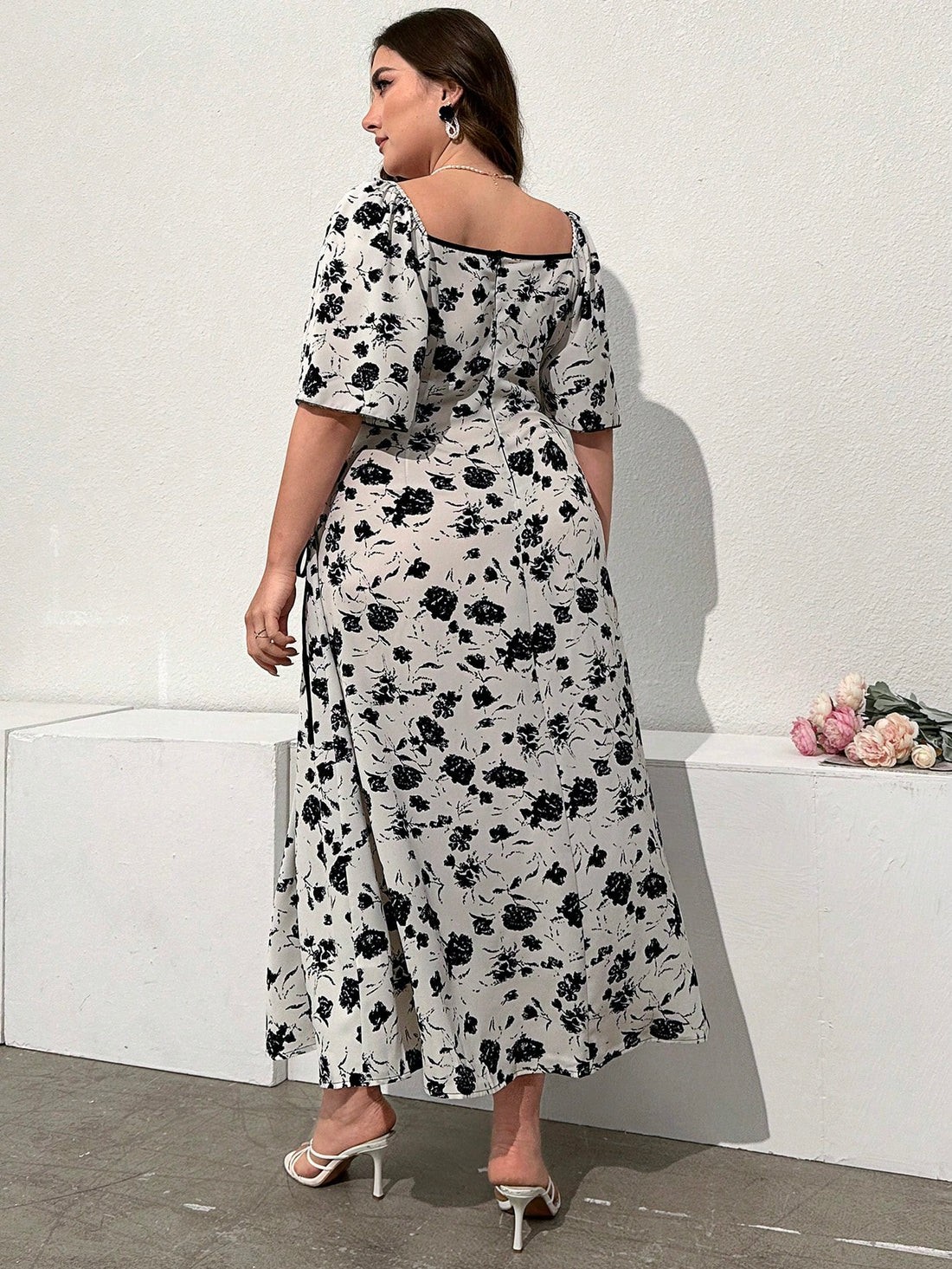 Embrace your inner bohemian goddess with our plus-size summer dress that's anything but ordinary! Swirling with eye-catching plant prints, this breezy beauty transitions effortlessly from sunny afternoon adventures to starlit soirées. Who says comfort can't be glamorous? Strut your stuff in this playful piece that celebrates your curves while turning heads at every elegant evening event!