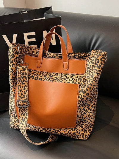 Elevate your style with our Leopard Print Tote Bag. It's not only stylish but also durable, perfect for any occasion. Crafted with versatility in mind, it's the perfect accessory for any outfit. Unleash your wild side with this trendy and functional tote bag.