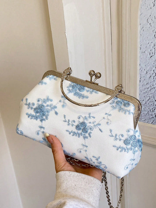 This Blue Lovely Flower Handbag is the perfect accessory for special occasions. Its elegant design and vibrant blue color will make you stand out in any event. With its spacious interior and durable material, this handbag is both stylish and practical. Elevate your outfit with this must-have accessory.