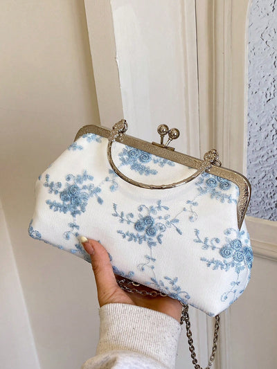 This Blue Lovely Flower Handbag is the perfect accessory for special occasions. Its elegant design and vibrant blue color will make you stand out in any event. With its spacious interior and durable material, this handbag is both stylish and practical. Elevate your outfit with this must-have accessory.