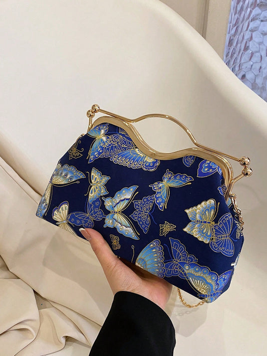 Introducing the Fluttering Elegance handbag, featuring a stunning butterfly pattern. Perfect for special occasions, this handbag adds a touch of elegance to any outfit. Crafted with quality materials, it is both stylish and functional. Elevate your look with this must-have accessory