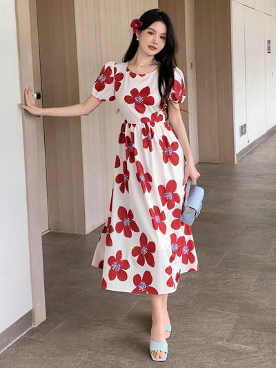 Elevate your wardrobe with our Floral Print Balloon Sleeve Dress. This feminine and flirty piece is a versatile staple that will take you from day to night. With its delicate floral print and playful balloon sleeves, you'll feel confident and stylish in any setting. Perfect for any occasion, this dress is a must-have for any fashion-forward individual.