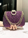 Introducing the Royal Radiance Evening Clutch - a stunning purple rhinestone clutch that adds a touch of elegance to any event. Crafted with care and precision, this clutch will make you feel like royalty. Perfect for any formal occasion, let the sparkling rhinestones add a touch of glamour to your look.