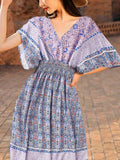 Discover the perfect vacation and leisure attire with our Vintage Floral Batwing Sleeves Long Dress. Made of high-quality fabric, this dress features a timeless floral design and comfortable batwing sleeves. Stay stylish and comfortable all day long, making it a must-have for your next getaway.