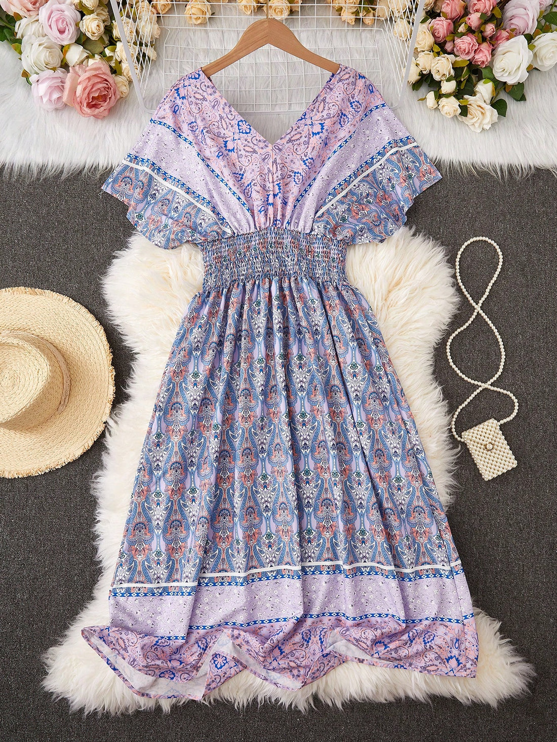 Discover the perfect vacation and leisure attire with our Vintage Floral Batwing Sleeves Long Dress. Made of high-quality fabric, this dress features a timeless floral design and comfortable batwing sleeves. Stay stylish and comfortable all day long, making it a must-have for your next getaway.