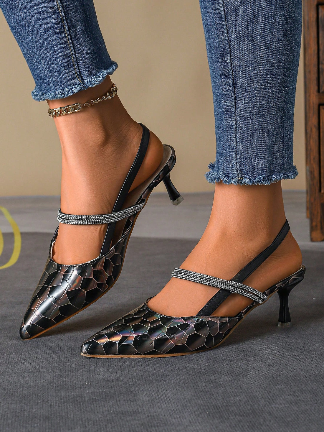 Elevate your style with these Sleek and Stylish Black Stiletto Heels. Perfect for autumn travel, the sleek design adds a touch of sophistication to any outfit. The stiletto heel offers a flattering lift, while the black color pairs effortlessly with any wardrobe. Travel in comfort and style with these must-have heels.