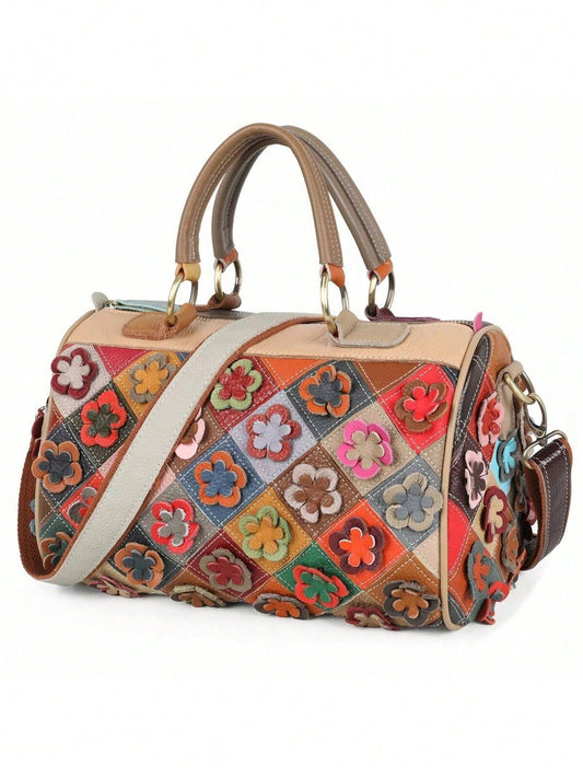 This Blooming Leather Boston Bag is a handcrafted, floral colorblock tote designed specifically for women. Made with high-quality leather, this bag boasts durability and style. With a unique combination of colors and beautiful floral accents, it's the perfect accessory for any fashion-forward woman.