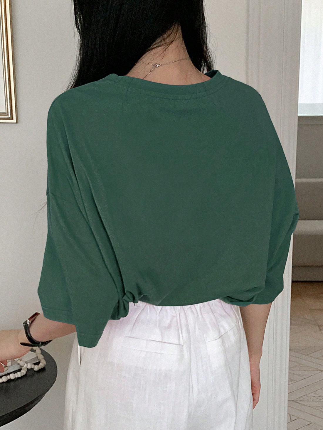 This women's t-shirt features a stylish butterfly print and bow tie decoration, perfect for the summer season. Made with high-quality materials, it is comfortable and durable. Add a touch of elegance to your wardrobe with this unique, eye-catching piece.